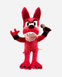 The 2025 Anime Plush Dog is a red plush toy with big ears, black eyebrows, sharp white teeth, and an expressive cartoon face. It holds a microphone in one hand, makes a rock on gesture with the other, and has black paws.