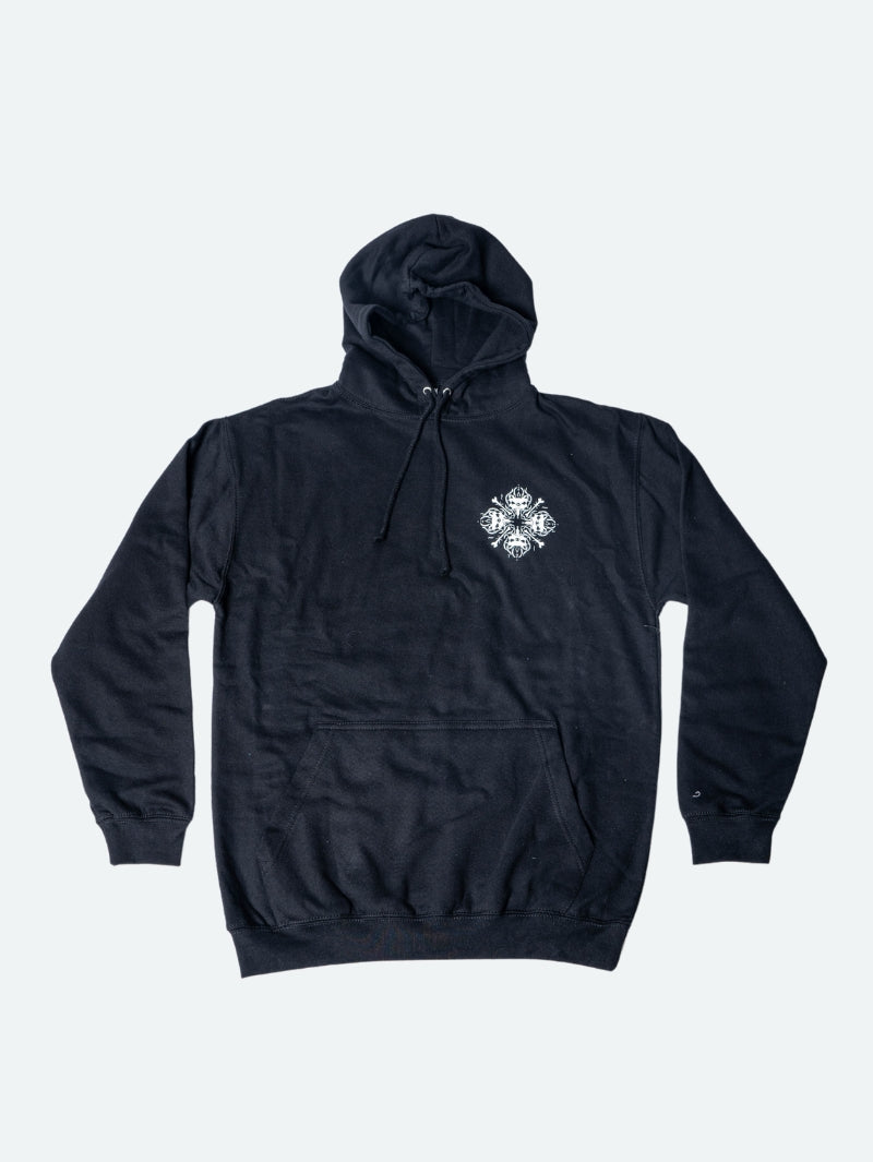 Black pullover hoodie featuring a small white design on the left chest area, where four mirrored snarling dog heads and crossed bones form a stylised snowflake shape.