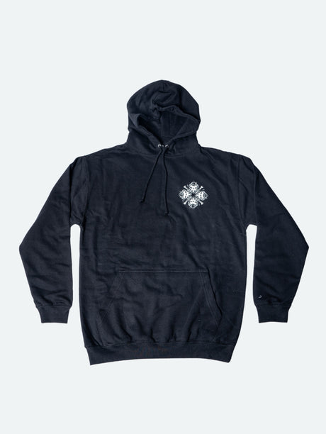 Black pullover hoodie featuring a small white design on the left chest area, where four mirrored snarling dog heads and crossed bones form a stylised snowflake shape.