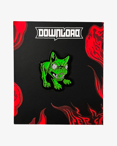 Download Festival green dog pin badge on black and red flame backing card.