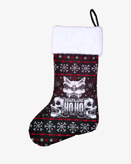 Download Festival Christmas stocking featuring a black background with red barbed wire, white snowflake and star patterns, two skull illustrations, and the iconic Download dog logo above the text 'Download Ho Ho' in bold lettering. The stocking has a fluffy white cuff and a black hanging loop for hanging.