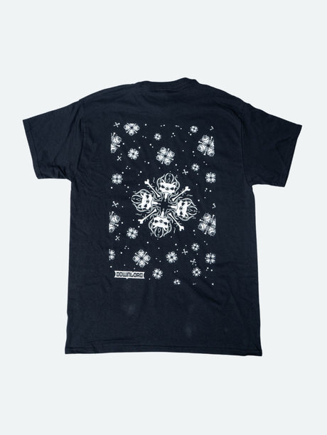 Back view of a black t-shirt featuring a large central white snowflake design composed of mirrored snarling dog heads and crossed bones, surrounded by smaller matching snowflakes and symbols, with the Download logo near the hem.