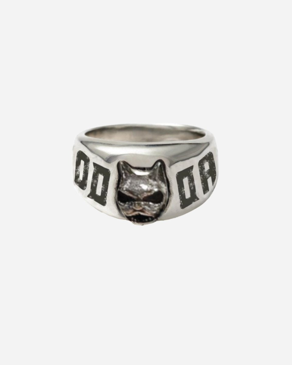 The 2025 Download Dog Head Ring displays a raised dog face at the center, with “DAD” engraved on both sides against a plain white background.