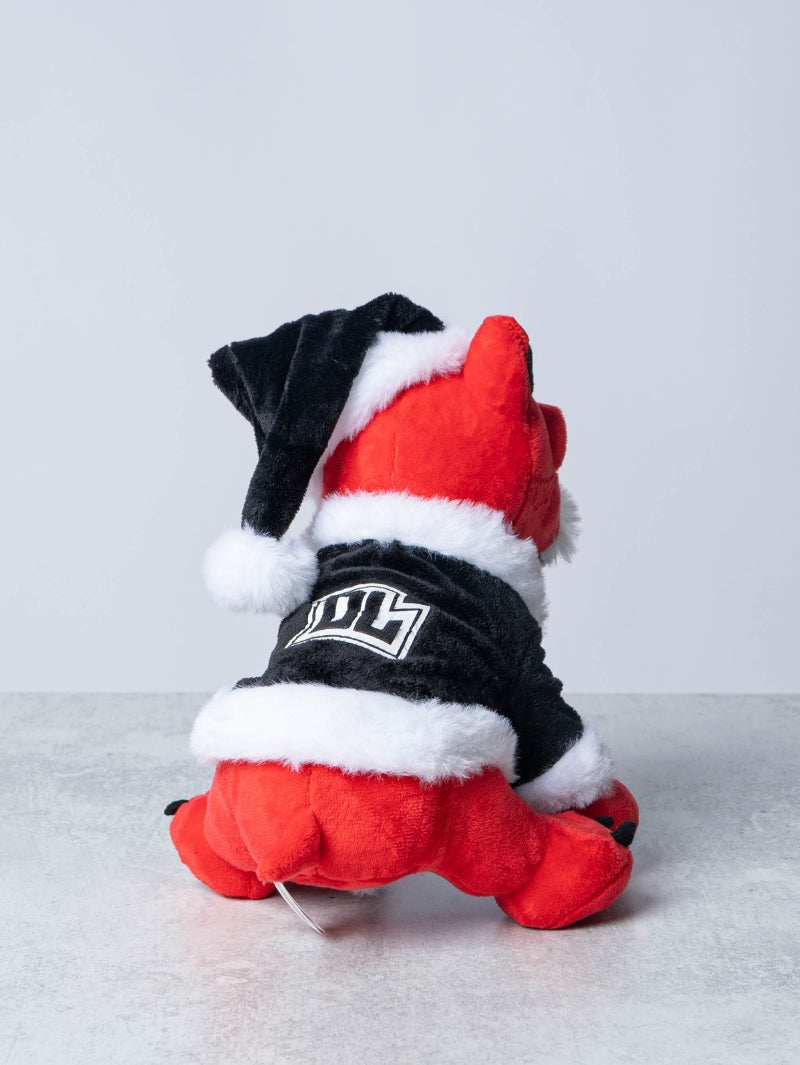 Rear view of a red plush Download Dog toy dressed in a black and white Santa outfit, featuring a fluffy trim and a Santa hat, with a bold white "DL" logo on the back of the jacket.