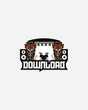 The 2025 Download Stage Pin Badge features DOWNLOAD in bold, flanked by two red bulldog heads, with a drum set, speakers, and stage lights creating a music stage design.