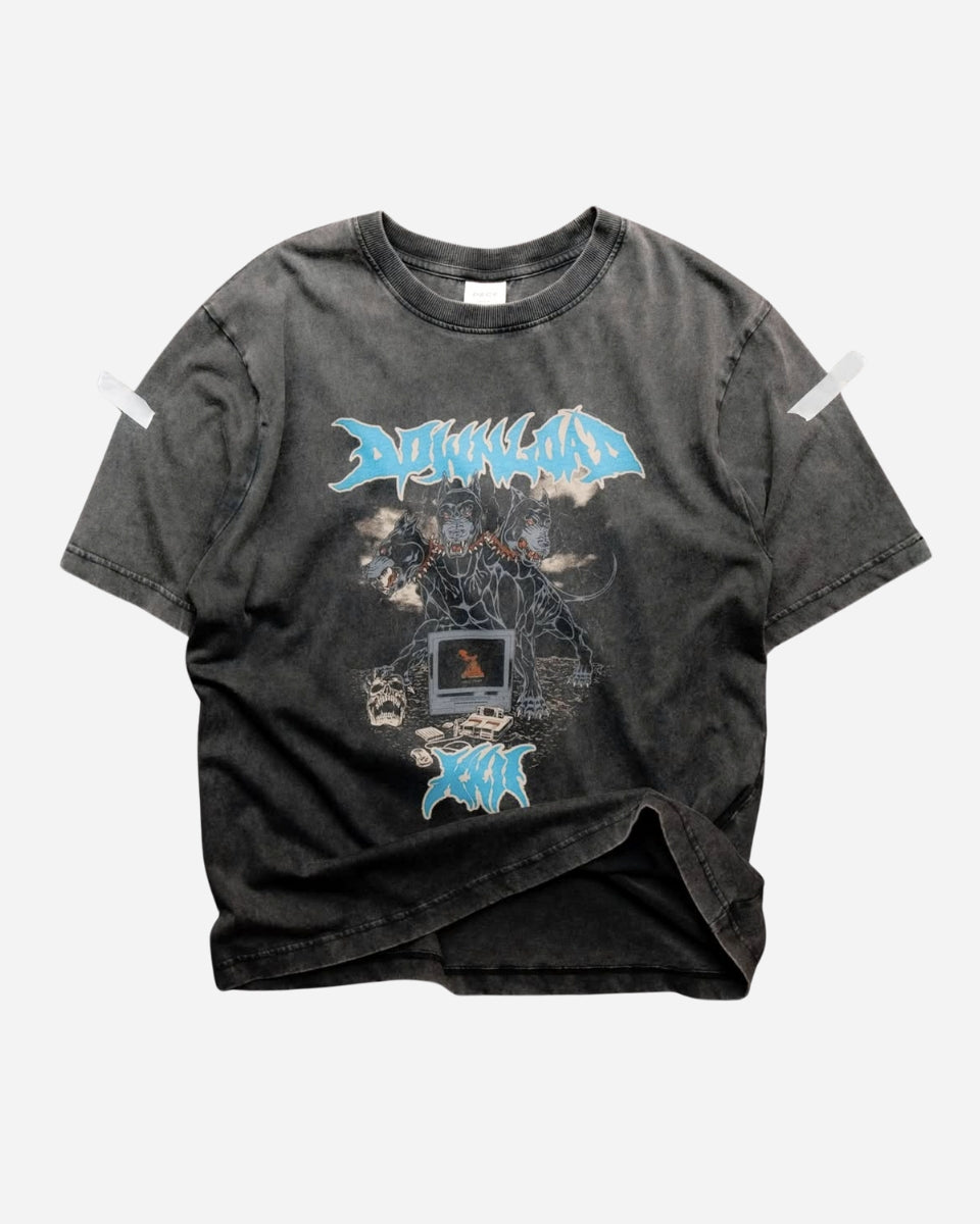 The P&Co Cerberus 2025 Event T-Shirt by 2025 is a faded black tee featuring blue text, a robotic figure, and an old computer graphic on the front. It’s displayed flat on a light background with tape at the shoulders.