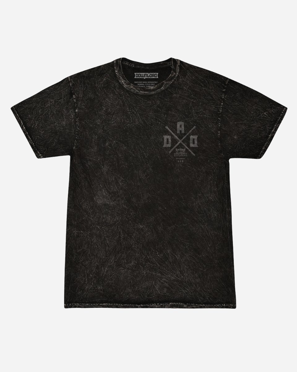 The Drumroll For Dad T-Shirt by 2025 is a black, short-sleeved tee with a subtle washed texture and a small geometric letters-and-lines logo on the left chest.