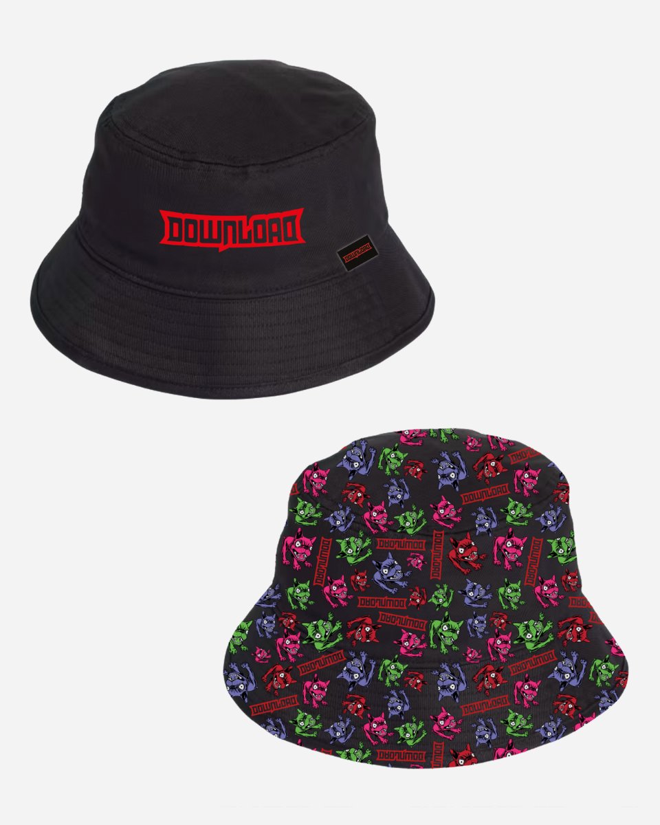 The 2025 Reversible Retro Multi Dog Bucket Hat features one side in plain black with a red DOWNLOAD logo, and the other in a colorful all-over print with logos and cartoon dog faces in green, purple, red, and blue on black.