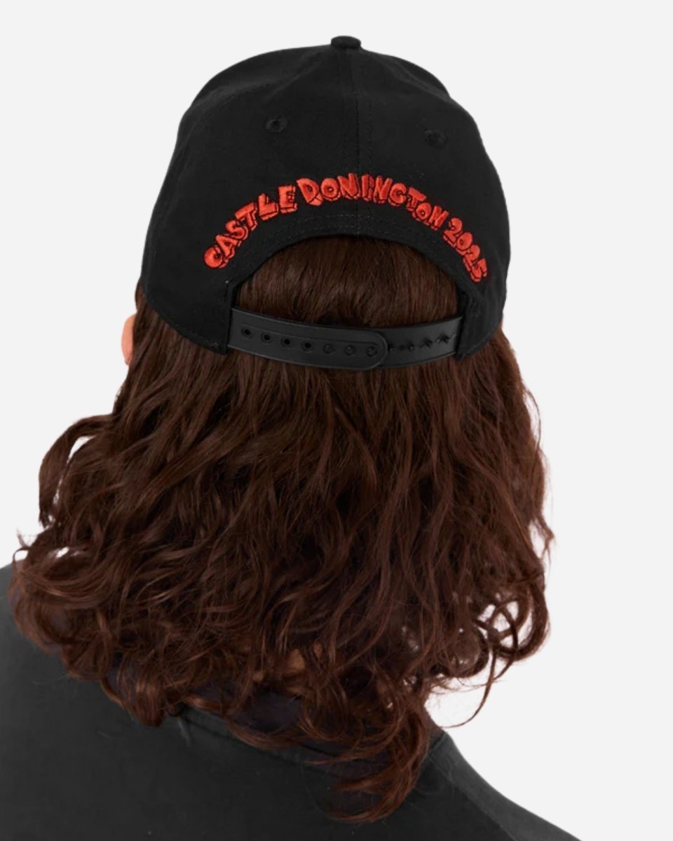 A person with long brown hair wears the Mary Wyatt Welcome to Paradise Cap by 2025, shown from behind against a plain light background.