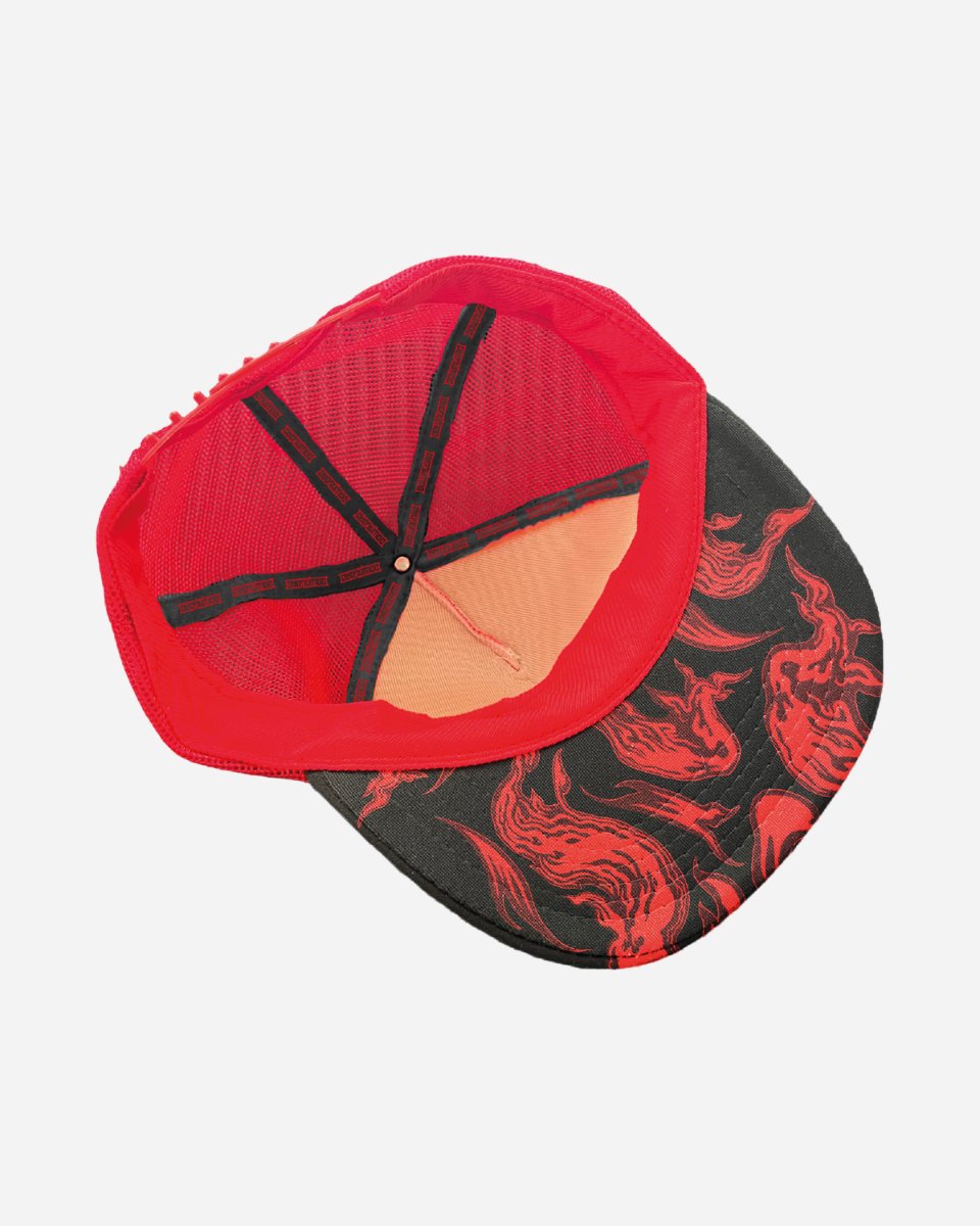 The 2025 Download Logo Flame Trucker Cap features a black bill with a red flame pattern, red mesh back, orange sweatband, and classic trucker style.