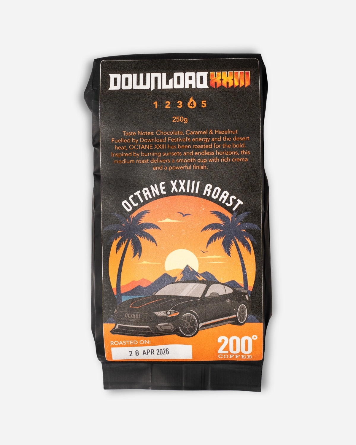 A 250g bag of Download 2026 Octane XXIII Roast Coffee with a label showing a black car, palm trees, mountains, and a sunset. Tasting notes: chocolate, caramel, and hazelnut.