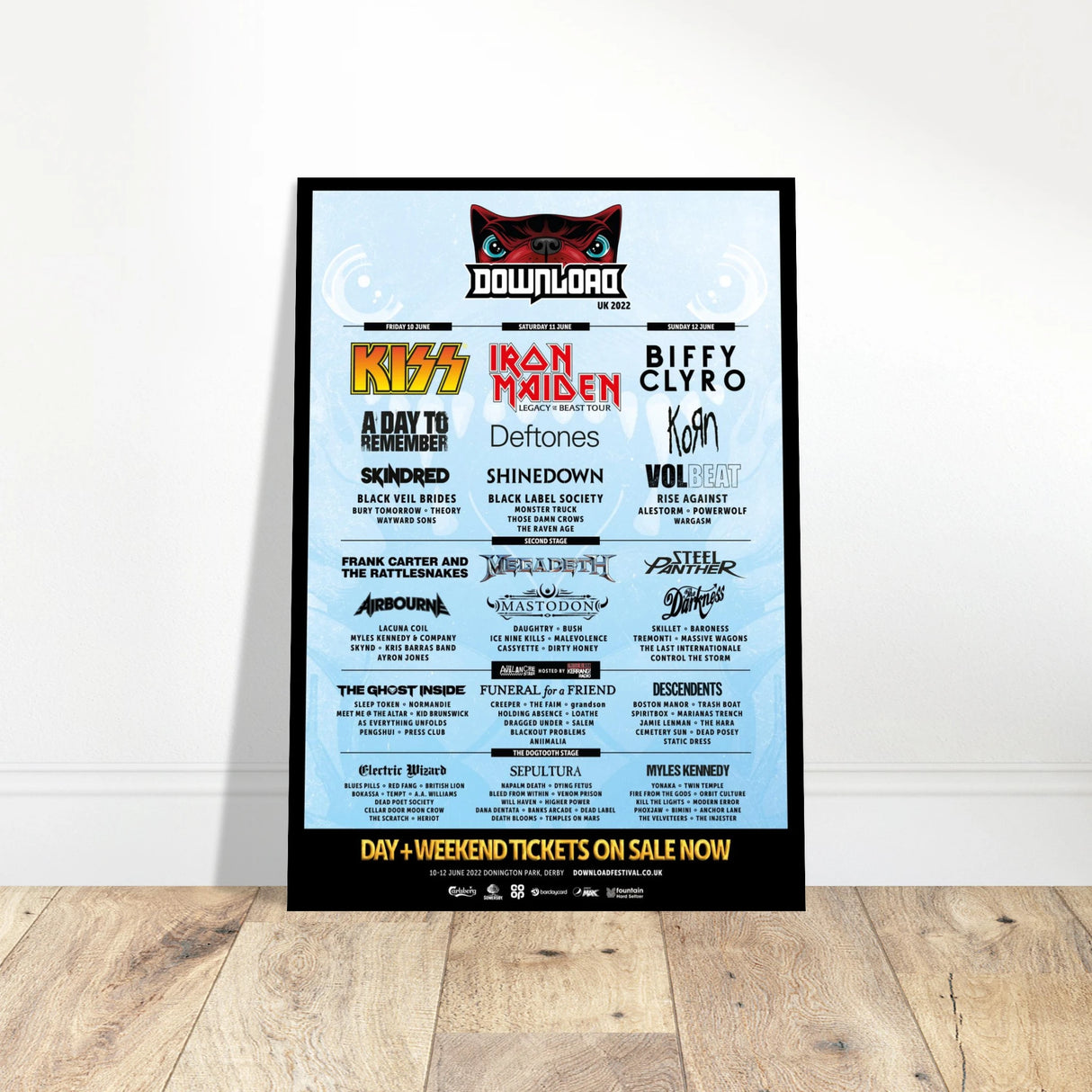 The Download Festival Shops Download 2022 Line Up Poster (A2) features Kiss, Iron Maiden, Biffy Clyro, Deftones, and Korn listed on semi-gloss paper with a blue background and stylized cat logo at the top.