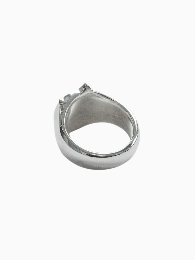 Back of sterling silver ring on white background.