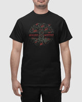 A man wears the Bound by Sound Black T-Shirt, showcasing an abstract dark green and red graphic with bold chest text. Crafted using eco-friendly processes, he stands with his arms relaxed at his sides.