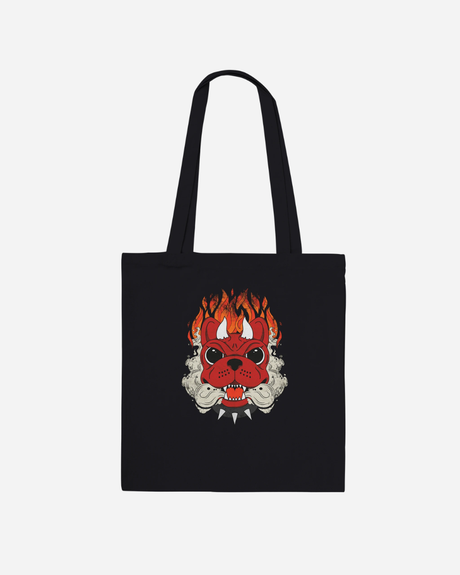 Introducing the Download Devil Dog Black Tote Bag from the Download Festival Shop: a black cotton tote bag showcasing a striking red devil dog face with flames above its head and sharp white teeth, all set against a plain white background. This made-to-order design blends bold style with the practicality of long handle tote bags.