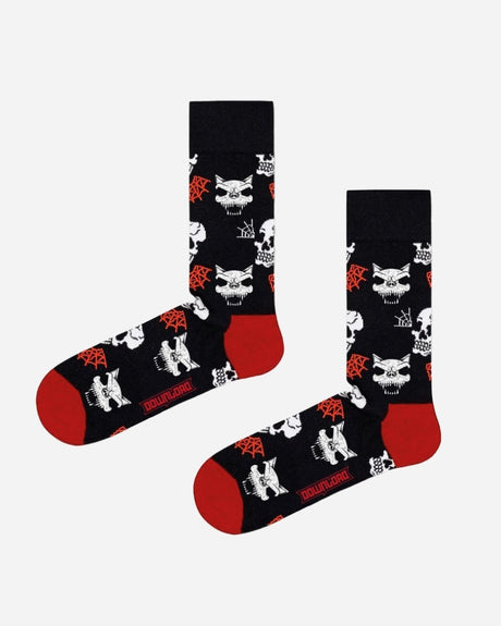 2025 Coffin Boxed Socks: Black socks featuring red toes and heels, white skulls, horned demon faces, red pentagrams, and DOWNWARD near the toes.