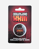 The 2025 Download Family Collector’s Coin is a limited edition collectible featuring bold festival branding, red and black packaging with a crowd silhouette, and "Download XXIII" labeling.