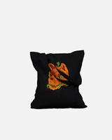 Introducing the Download Pumpkin Head Black Tote Bag from the Download Festival Shop, featuring a bold orange stylized flower design with green accents at its center. Set against a sleek black background, this tote bag makes the perfect accessory for your favorite reading nook or as a striking addition to your collection of made-to-order festival gear.