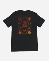 The DLXXIII Legends Of The Page Black T-Shirt from Download Festival Shop features vibrant DTG floral art and "Once Upon a Time at Download" above fangs on soft Airlume cotton. Eco-friendly, stylish, and perfect for festival fans.