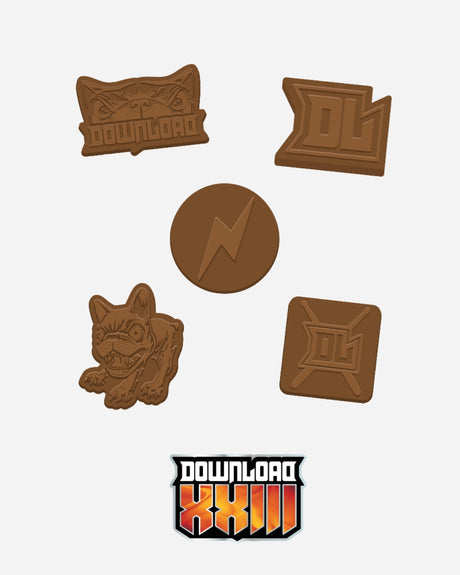 Five brown cookie shapes—cat head, two stylized DL logos, lightning bolt circle, and crouching dog—sit above the Download Family XXIII Countdown Calendar by 2026 and the festival logo.