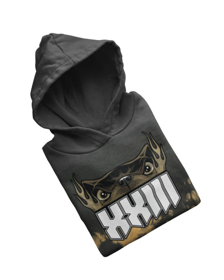 A folded PRE-ORDER 2026 Exclusive Tie Dye Line-Up Hoodie from Download Festival Shop sits with its hood up against a white background—featuring unique tie dye and line-up graphics, it’s a standout addition to any festival collection.