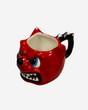 The Download 2026 Dog Head Shaped Mug features a unique design resembling a dog's head, crafted by the brand Download 2026.