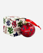 The 2025 Download Glass Bauble is a 12cm ornament with a red ribbon, featuring green, blue, and red cartoon dragons. It comes with a matching bauble box decorated in the same dragon pattern and bold DRAGON lettering.