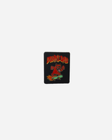 A Download 2026 pin badge showing a red devil on a green skateboard with flames, plus "DOWNLOAD" in bold red letters above.