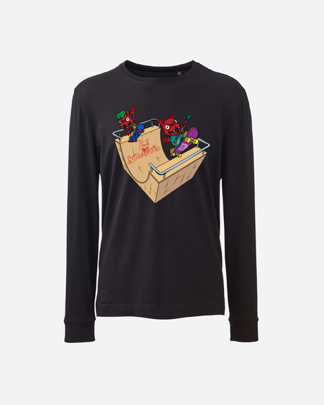 The Download 2026 Skate Ramp Long Sleeve features a black design with three playful red cartoon creatures skateboarding in a wooden half-pipe, holding a green spray can, and "MONSTER" tagged in red on the ramp.