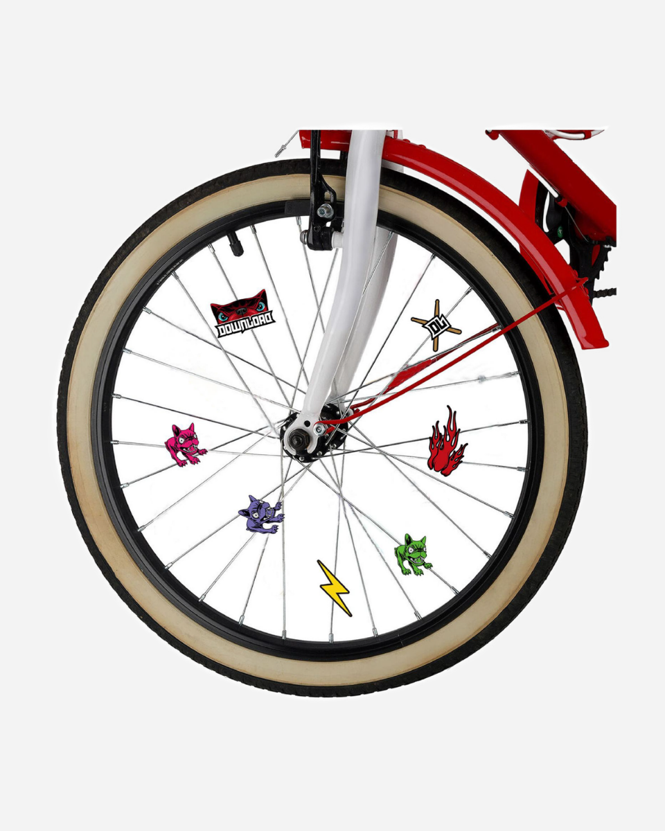 Close-up of a red-framed bicycle front wheel with whitewall tires, decorated with Download 2026's Wheelchair Spoke Charms featuring cartoon animals, a lightning bolt, flame, star, and a TOUYMADRE label on the spokes.
