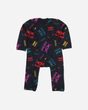 The Mini Mosher Baby Sleepsuit by Download 2026 is a long-sleeve, footless romper with a black base, decorated with colorful wolf faces and bold shapes. Snap buttons at the legs allow for easy fastening.